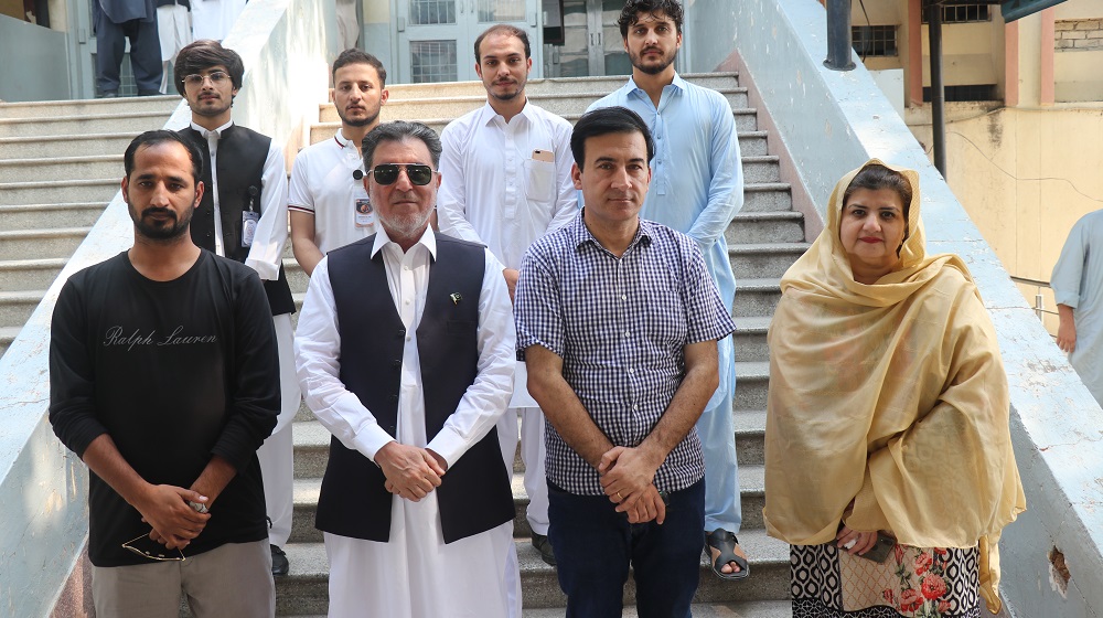 The Vice Chancellor Prof. Dr. Muhammad Naeem Qazi is with the newly installed club of English Literary and Linguistics cabinet after Teachers' Day celebrations along with the faculty here on Monday.